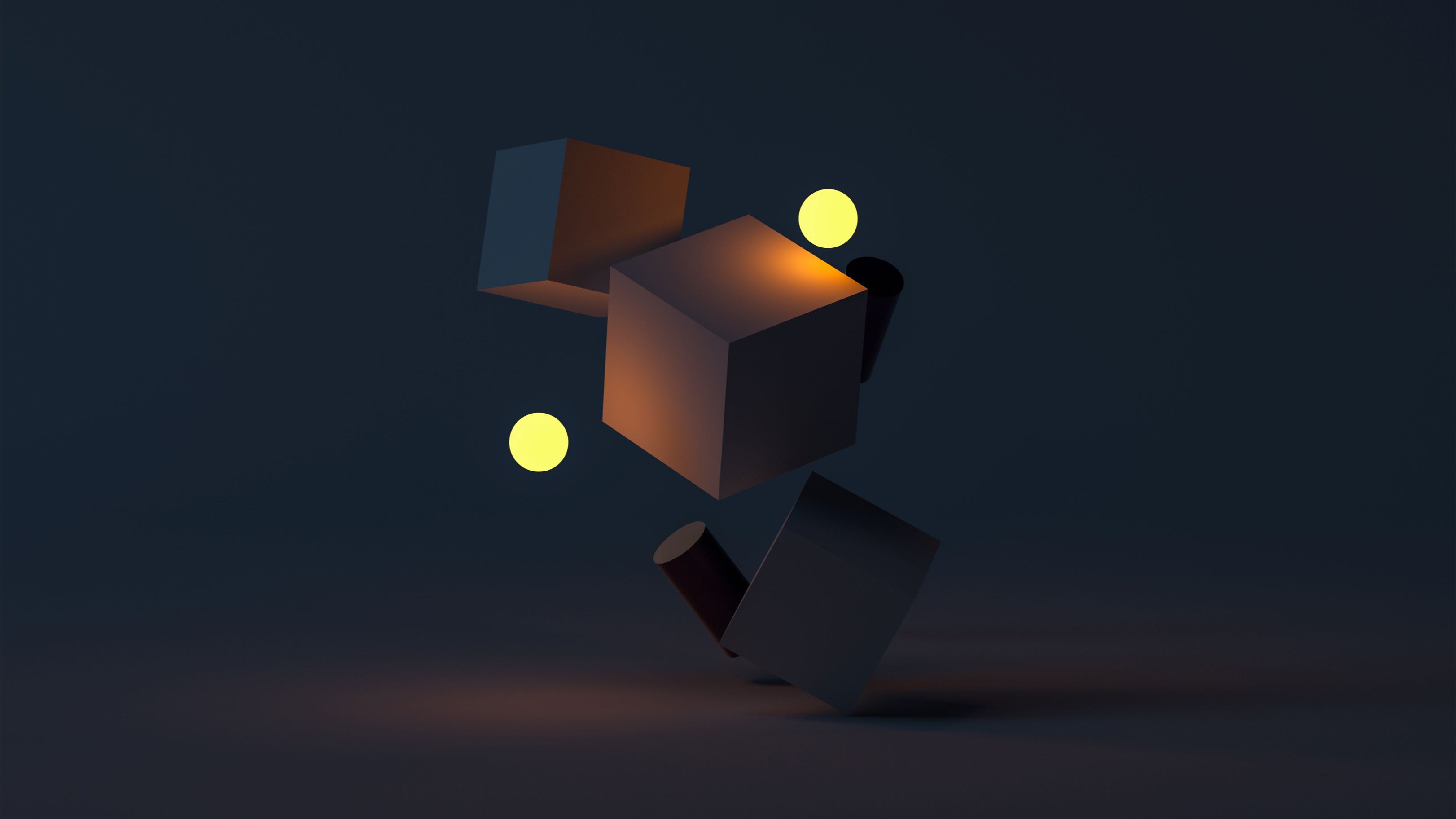 Three dark cubes and two yellow glowing spheres floating against a dark background with subtle orange light on one cube.