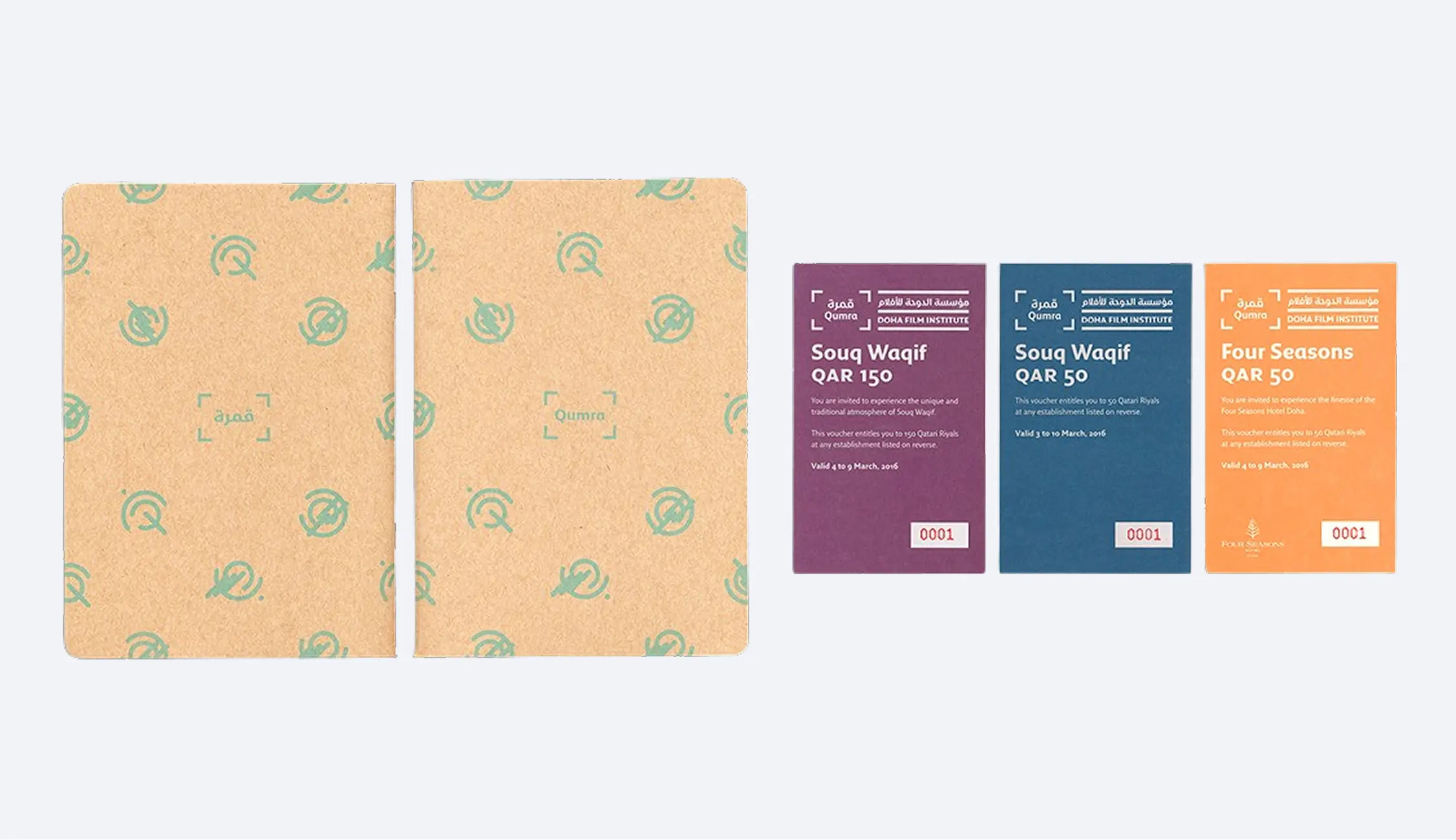 Two brown paper folders with green Qumra logos alongside three colorful vouchers in purple, blue, and orange for Souq Waqif and Four Seasons, each with QAR amounts and validity dates.