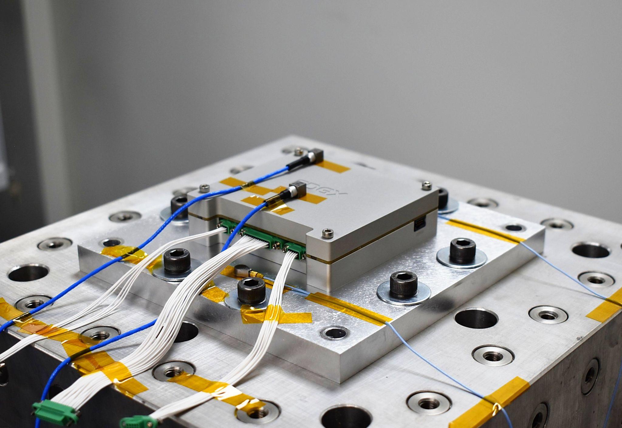 Sterna bolted to the vibration test fixture in the EDGX lab