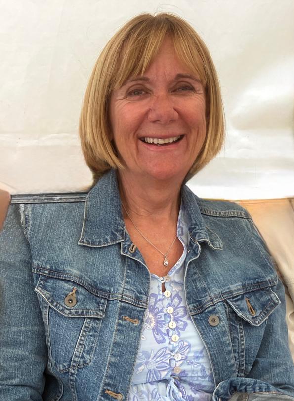 a woman smiling at the camera
