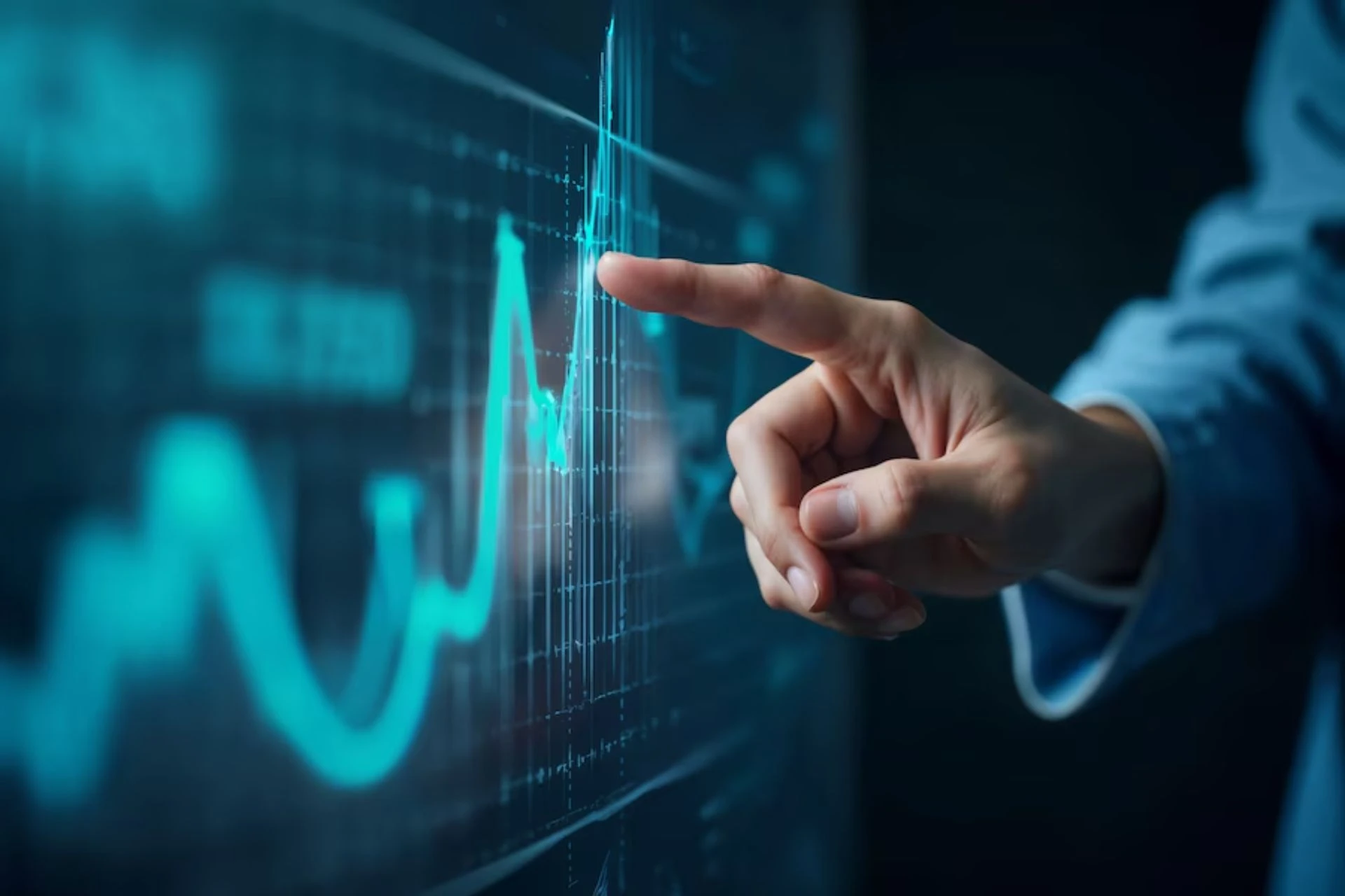 Imagem de um gráfico financeiro em tela digital, com mão apontando para os dados, representando análise de mercado e investimentos.