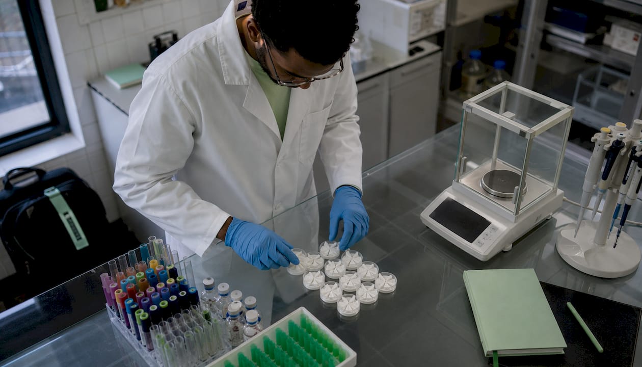 Lab technician testing nicotine pouches