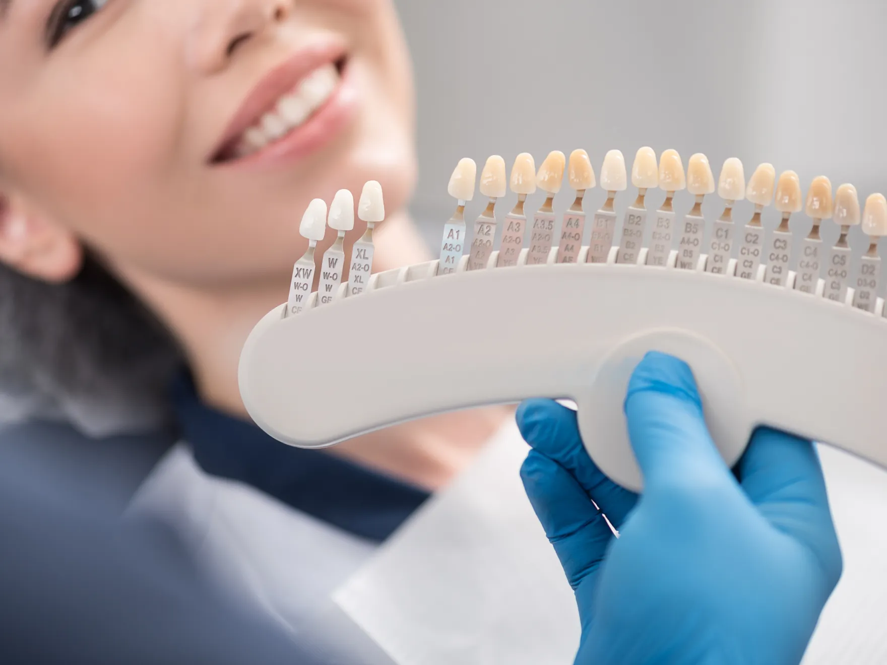 woman holding a comb with toothbrushes in her hand Dynamic Dental