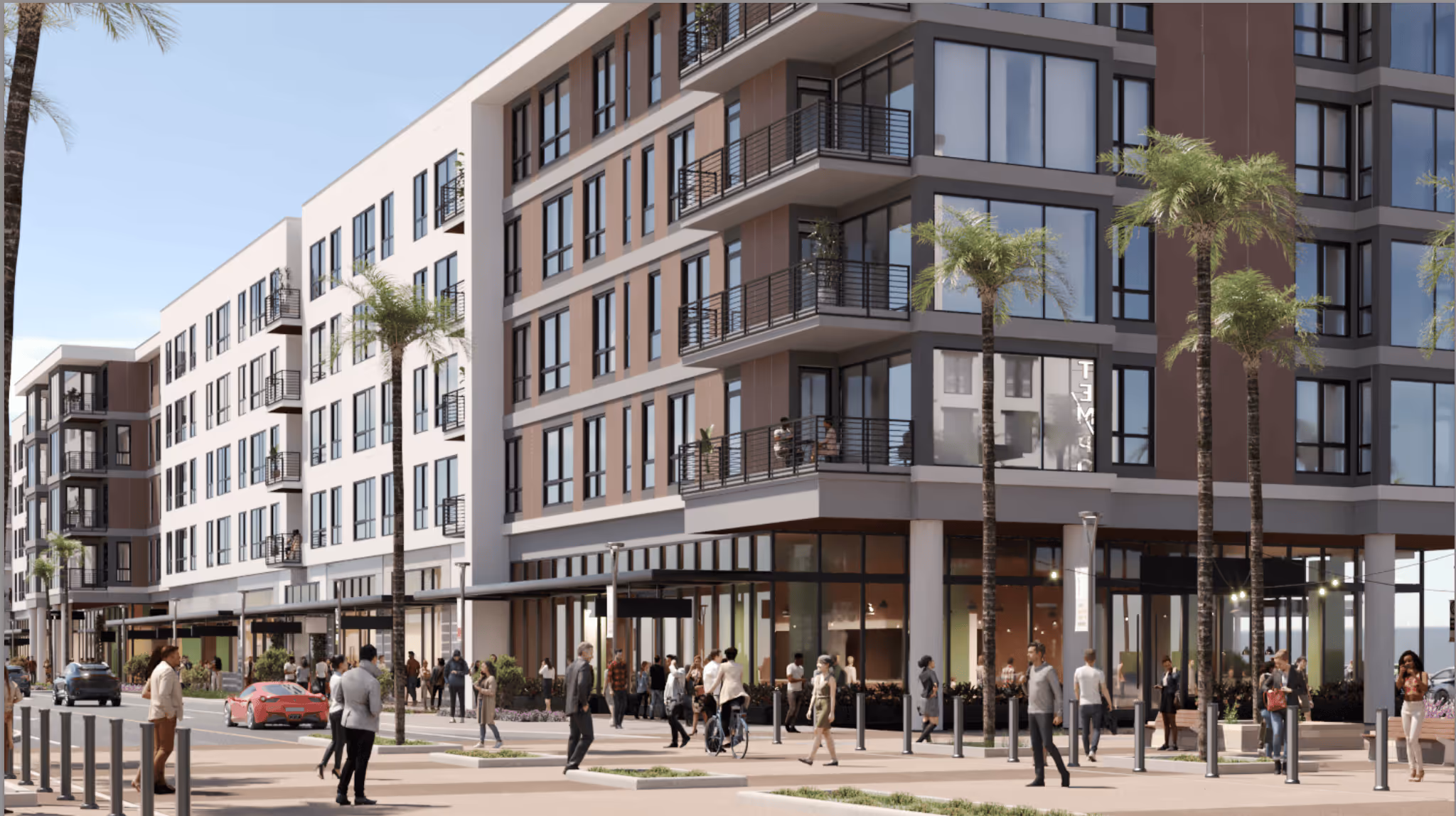 Exterior street view of the modern apartment building with ground-floor retail and palm-tree-lined sidewalks at The Astrie in Tucson, AZ.