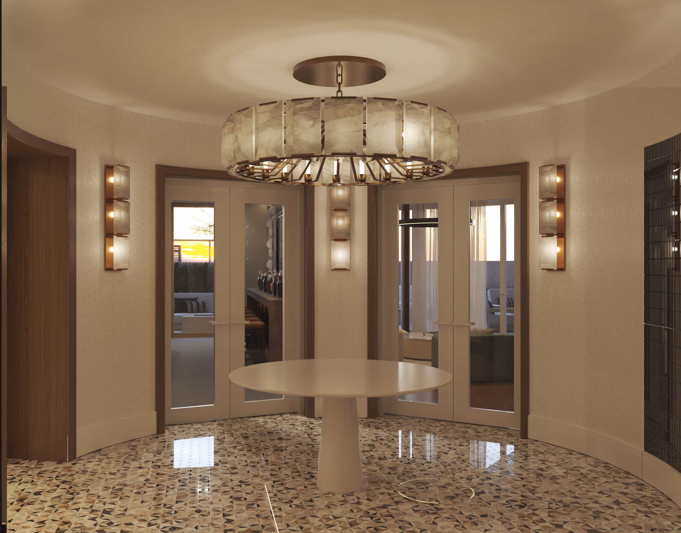 Luxurious circular lobby and reception area with patterned flooring, a white center table, and a contemporary chandelier at The Astrie in Tucson, AZ.