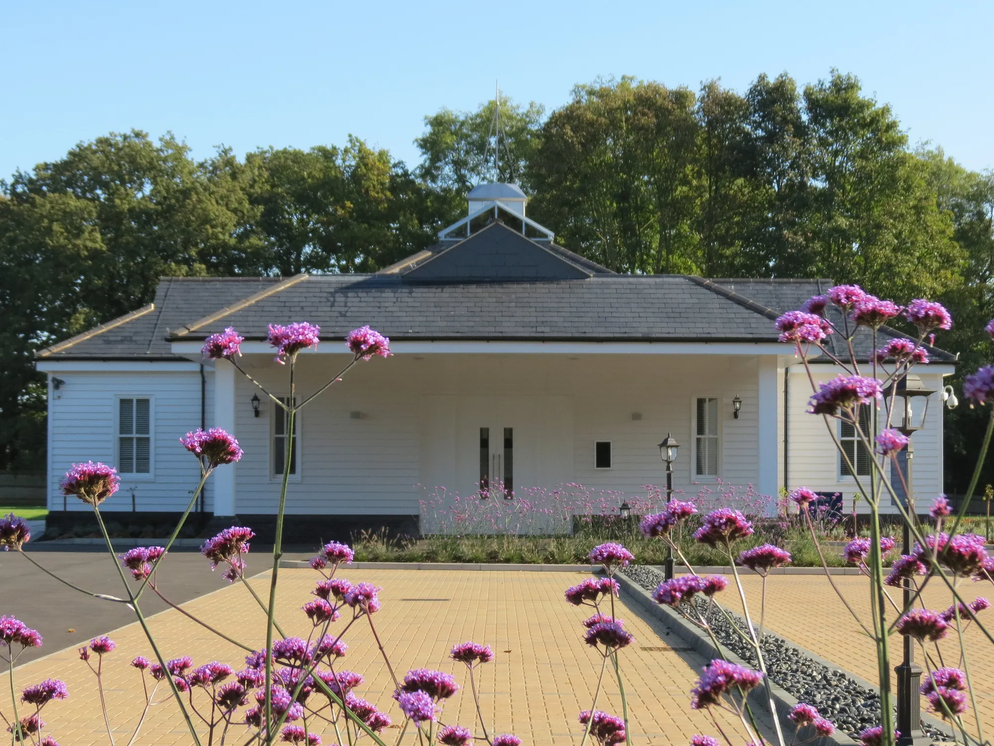 Crematorium and cemetery, Brentwood: the single storey chapel building set within planted grounds