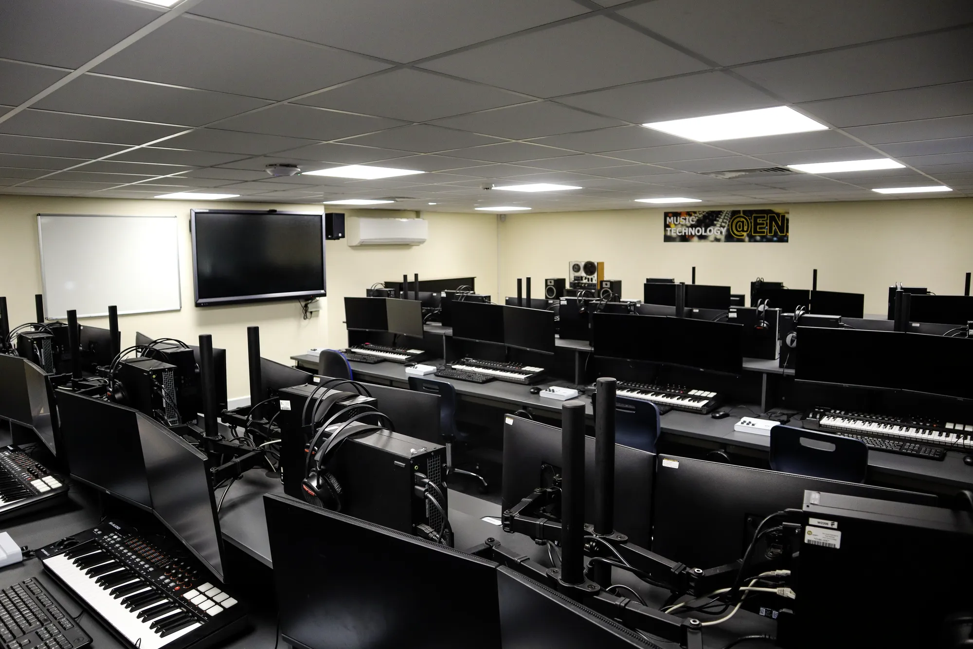 East Norfolk College: music technology room with workstations and keyboard