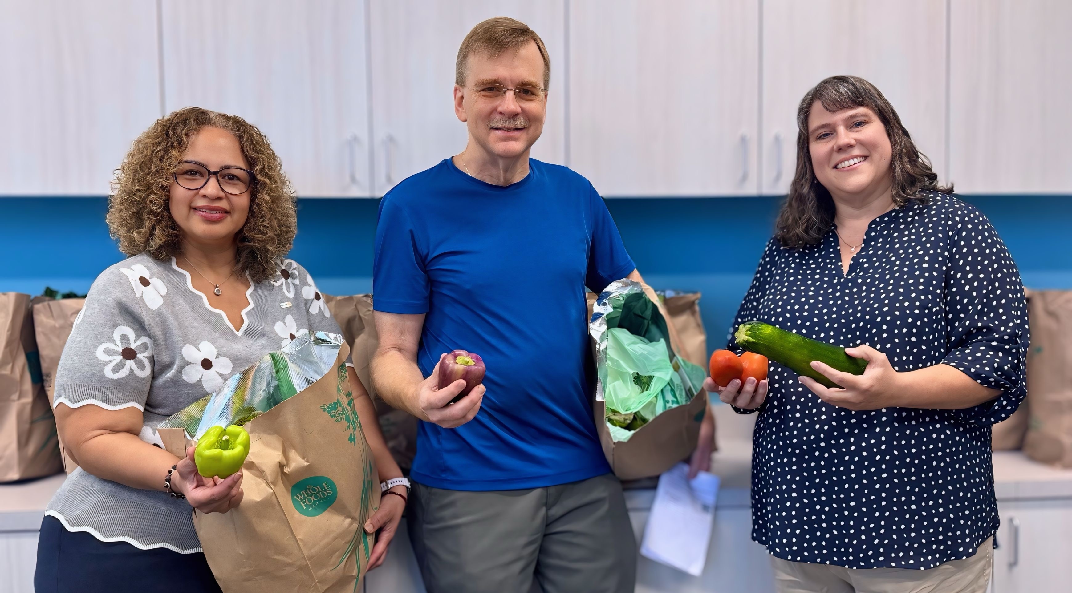 MKHC leadership pictured with Community FarmShare member