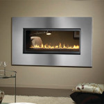 Montigo Direct Vent Flush Face Multi-Sided Fireplace L42DF-ST with a sleek stainless steel frame and contemporary linear burner displaying vibrant flames, set in a modern interior.