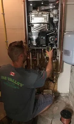 Technician holding a clean air conditioning filter for energy efficiency