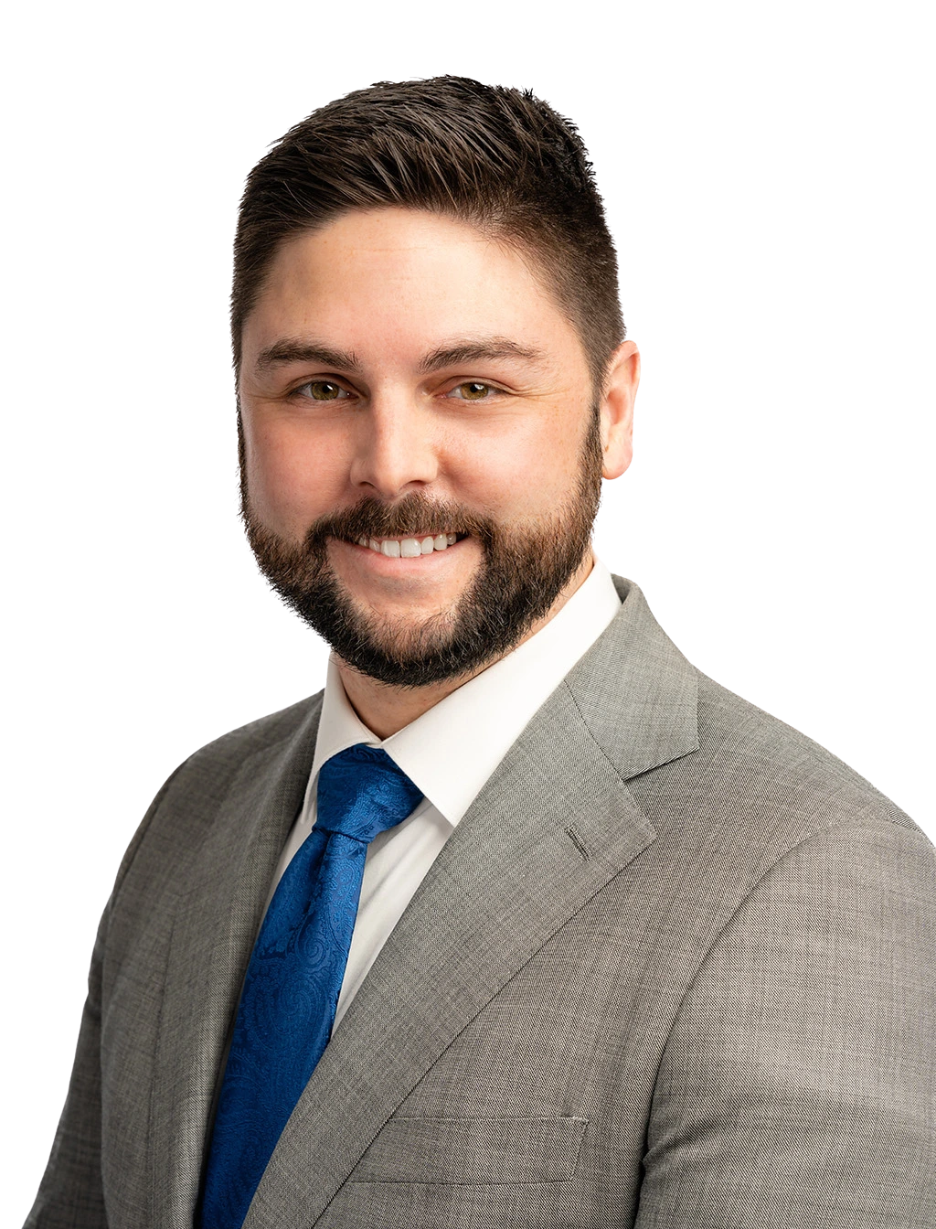 Professional headshot of a team member wearing business attire, smiling confidently against a plain white background.Professional headshot of a team member wearing business attire, smiling confidently against a plain white background.