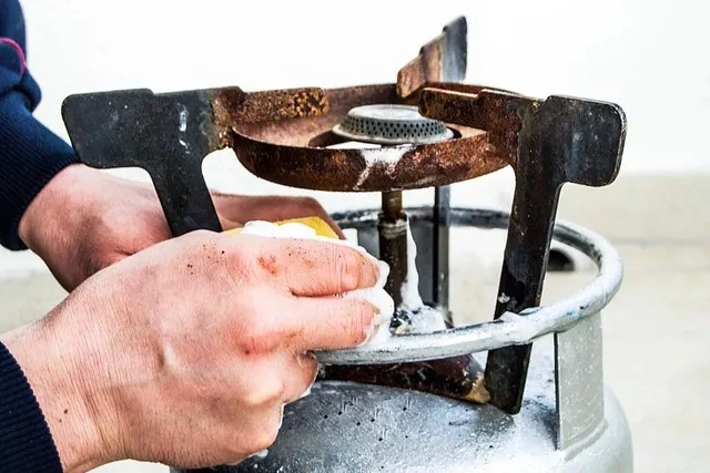 Testing a propane tank for leaks.