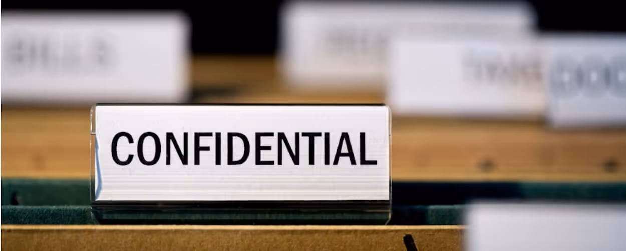 file-folder-with-confidential-label-in-filing-cabinet-picture-id94964765-1