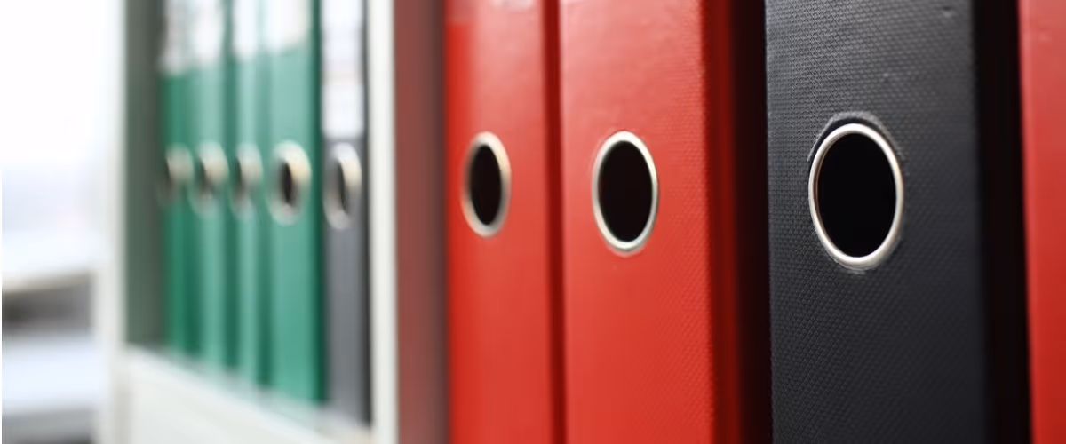 book-shelf-full-of-file-folder-in-office-closeup-picture-id1127297085