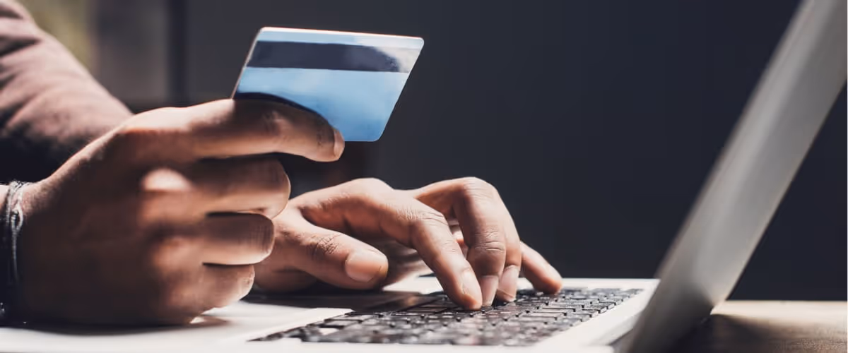 man-shopping-online-using-laptop-computer-and-credit-card-picture-id1126621519