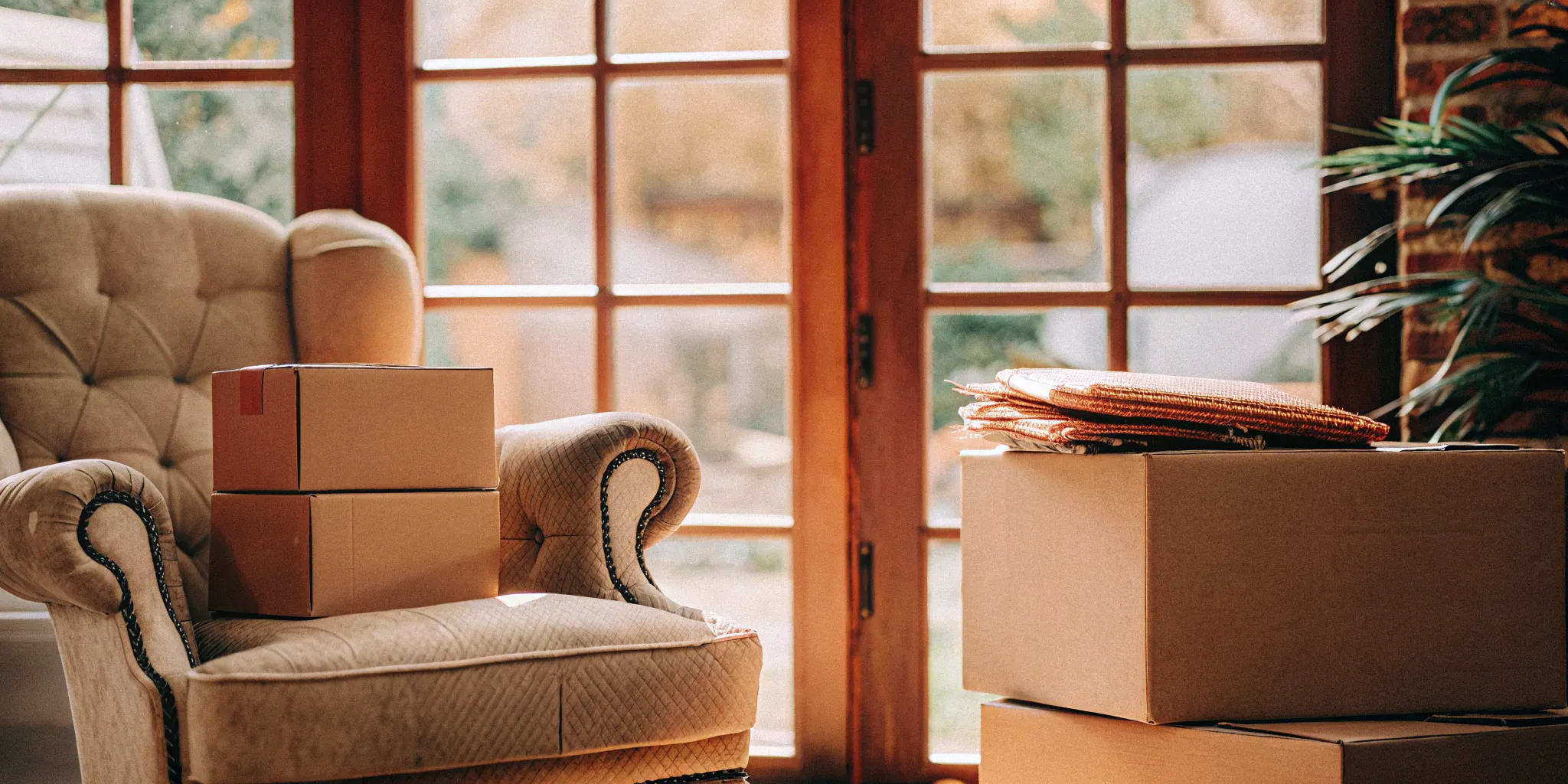 Packed boxes ready for emergency moving services.