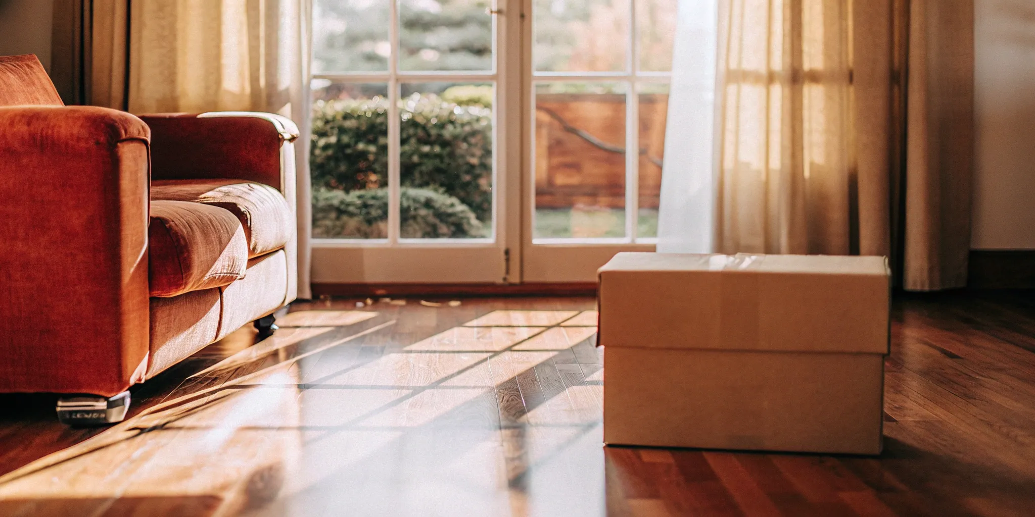 A packed moving box in a room, ready for one of the best moving companies.