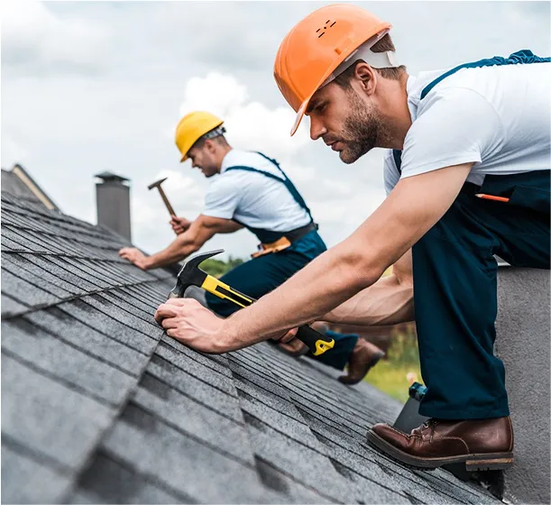 Two men are installing a new roof.