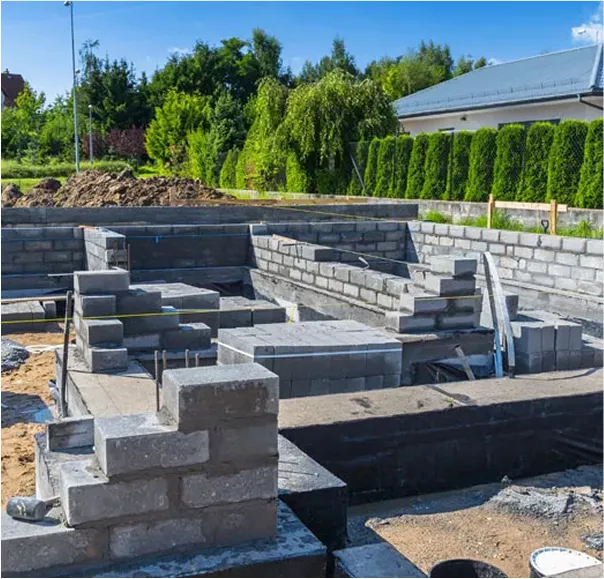 Concrete block foundation walls under construction for a residential building.