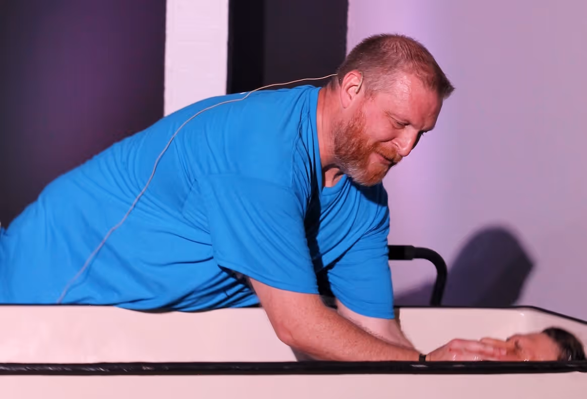 A member of the Northshore Gospel Network (Chad Richardson) baptizing someone at Celebration Church Mandeville/Covington