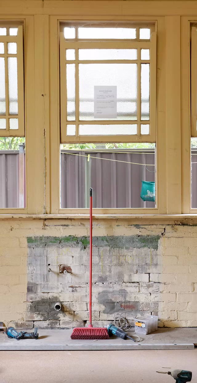 Stripped-back room during structural renovation, highlighting before stage in our professional renovation process.
