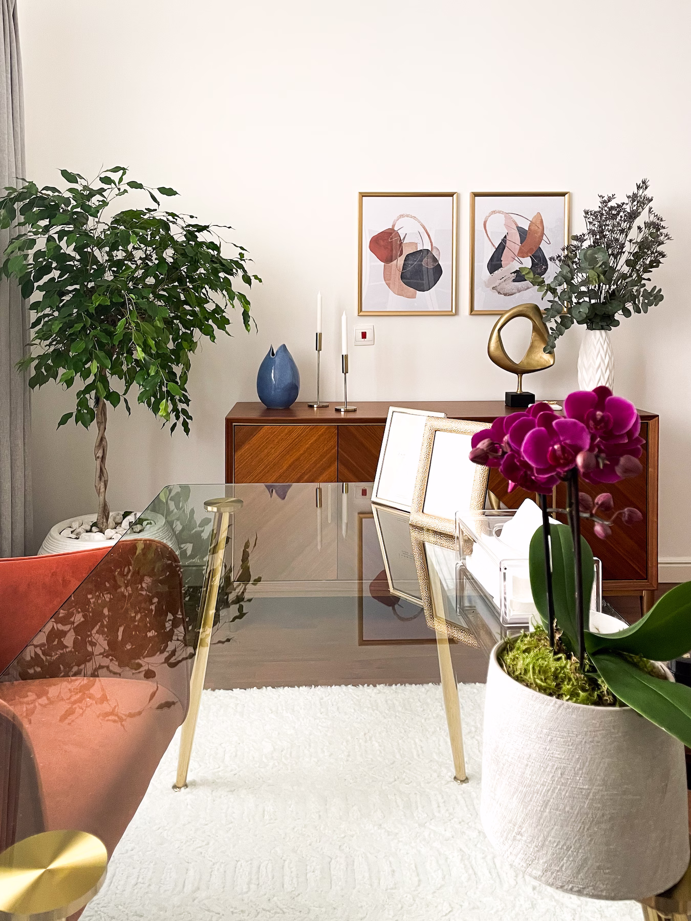 Elegant home office design in Doha with modern desk, warm colours, and layered lighting by Roberts Renovations.