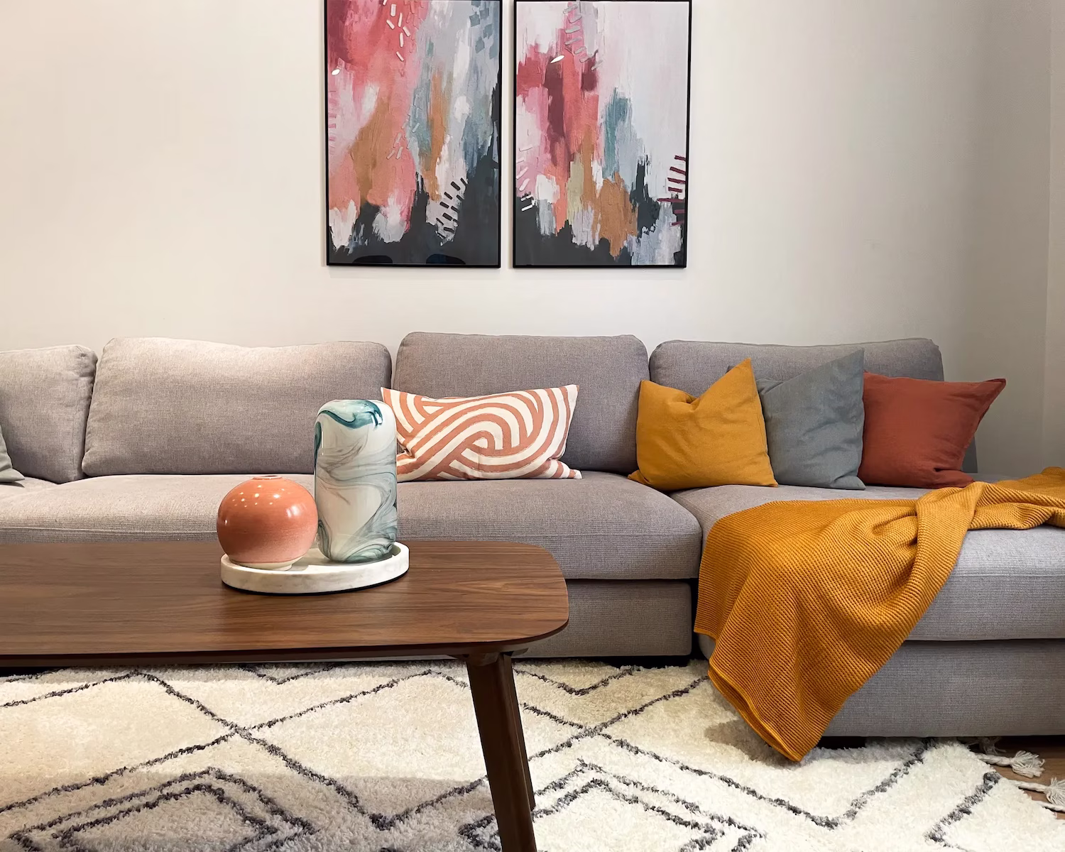Bright living space styled by Roberts Renovations, featuring elegant décor, neutral tones, and thoughtful furniture placement that reflect the bespoke quality of their interior design packages.