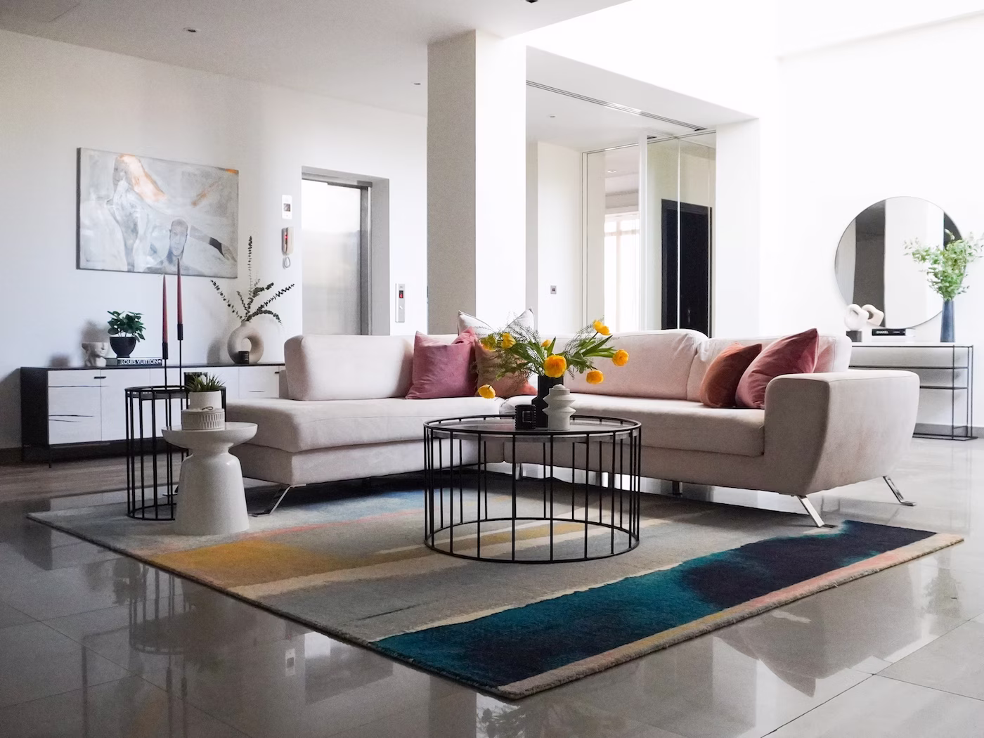 Modern living room interior designed by Roberts Renovations in Bradford, featuring neutral tones, soft textures, and contemporary furniture that balance comfort with style.