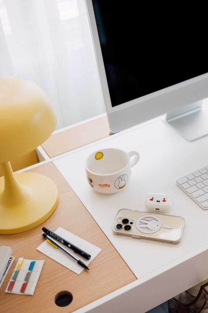 Remote interior design workspace with colour swatches, desk accessories and planning tools used for a teenage bedroom project by Roberts Renovations