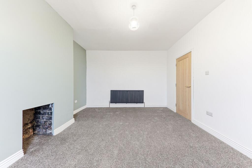 Master bedroom renovation in Pudsey buy-to-let property with new carpet and neutral décor
