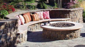 A fire pit with built-in seating.