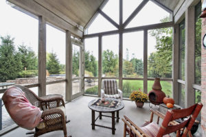 Lovely screen room with expansive view of backyard