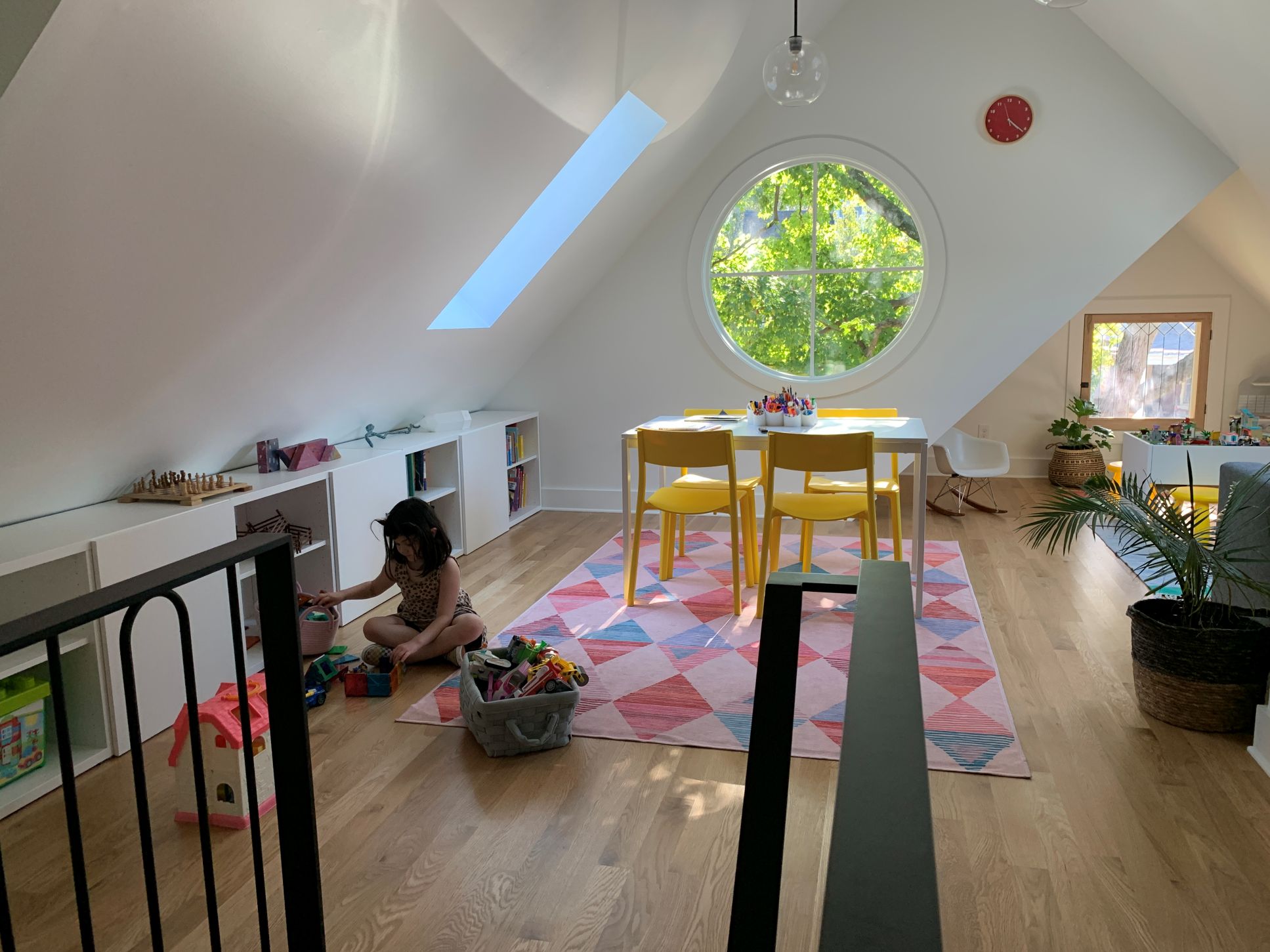 Play room with circle window.