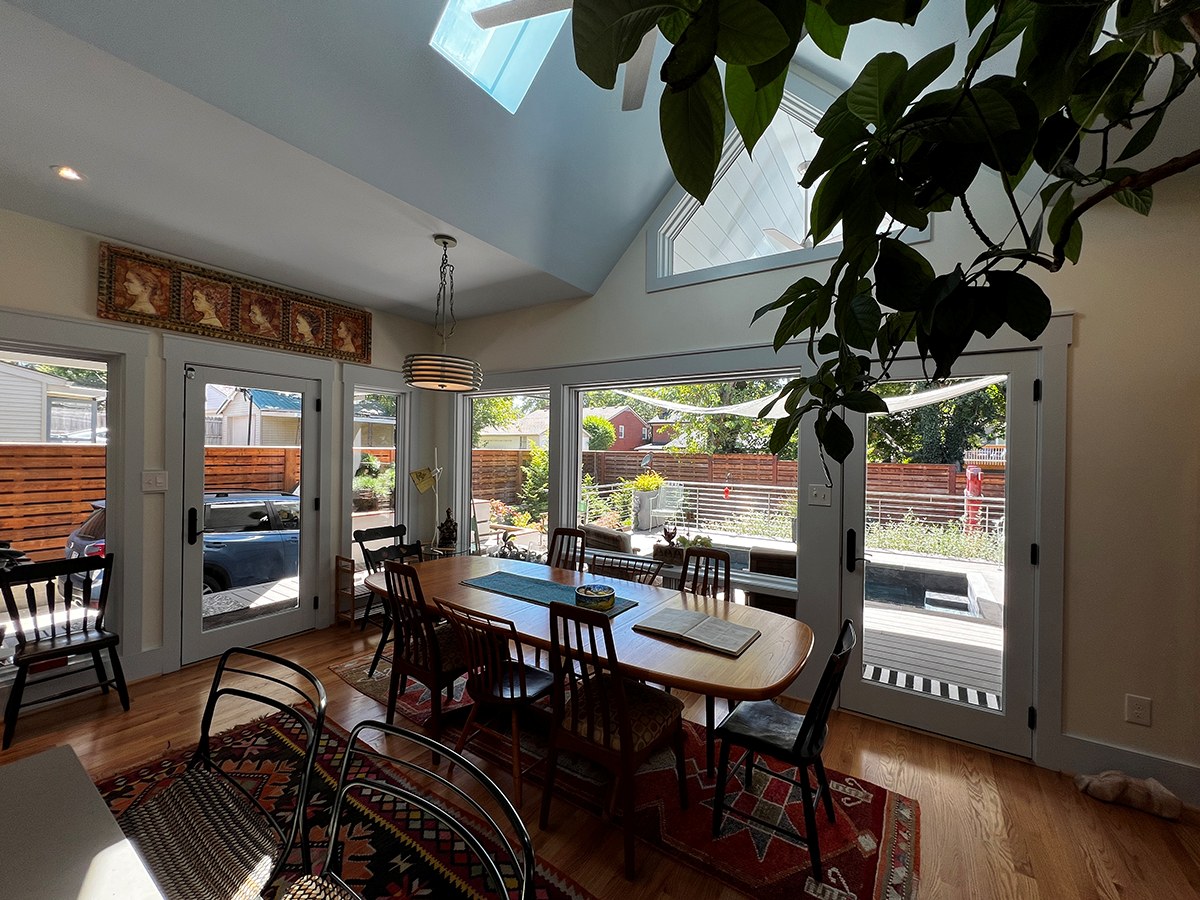 Interior Dinning Room Kitchen with view to the outside deck and pool