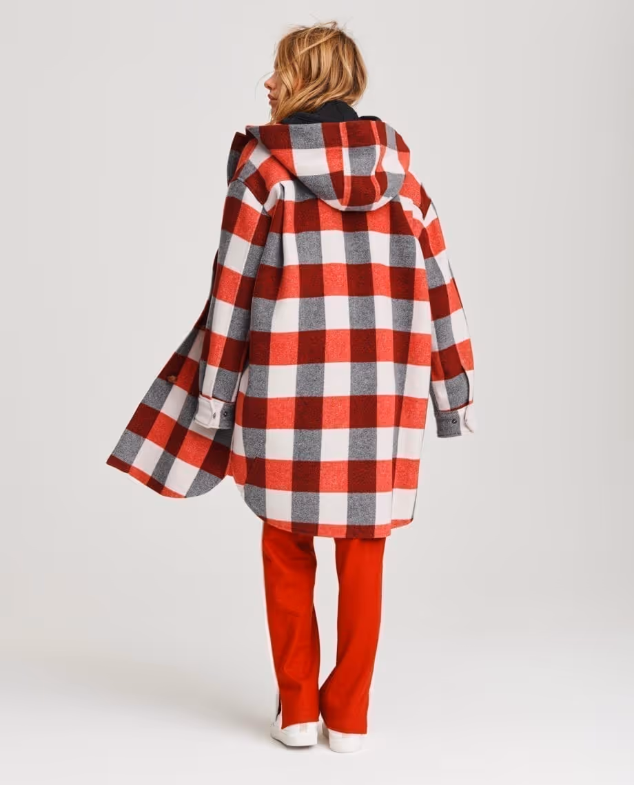women in red black and white plaid coat