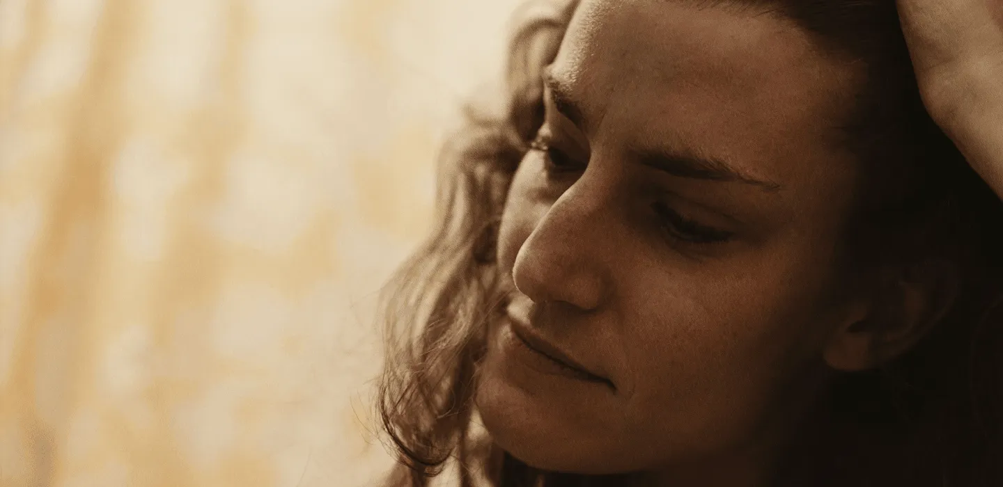 Woman looking past camera