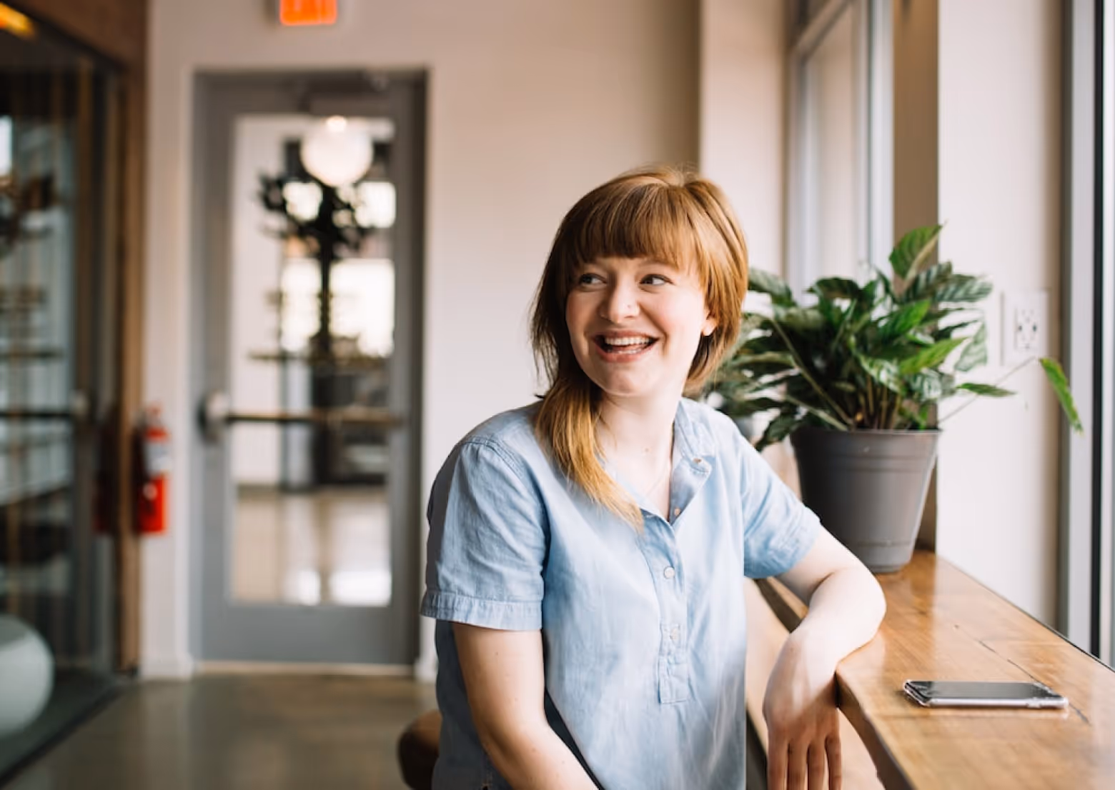 Young woman smiling in cafe