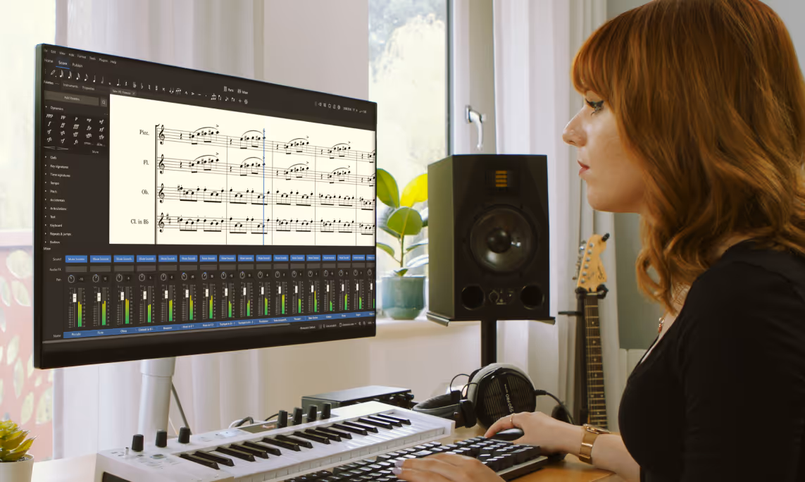 Muse Group creator using MuseScore notation software and MIDI keyboard for music composition