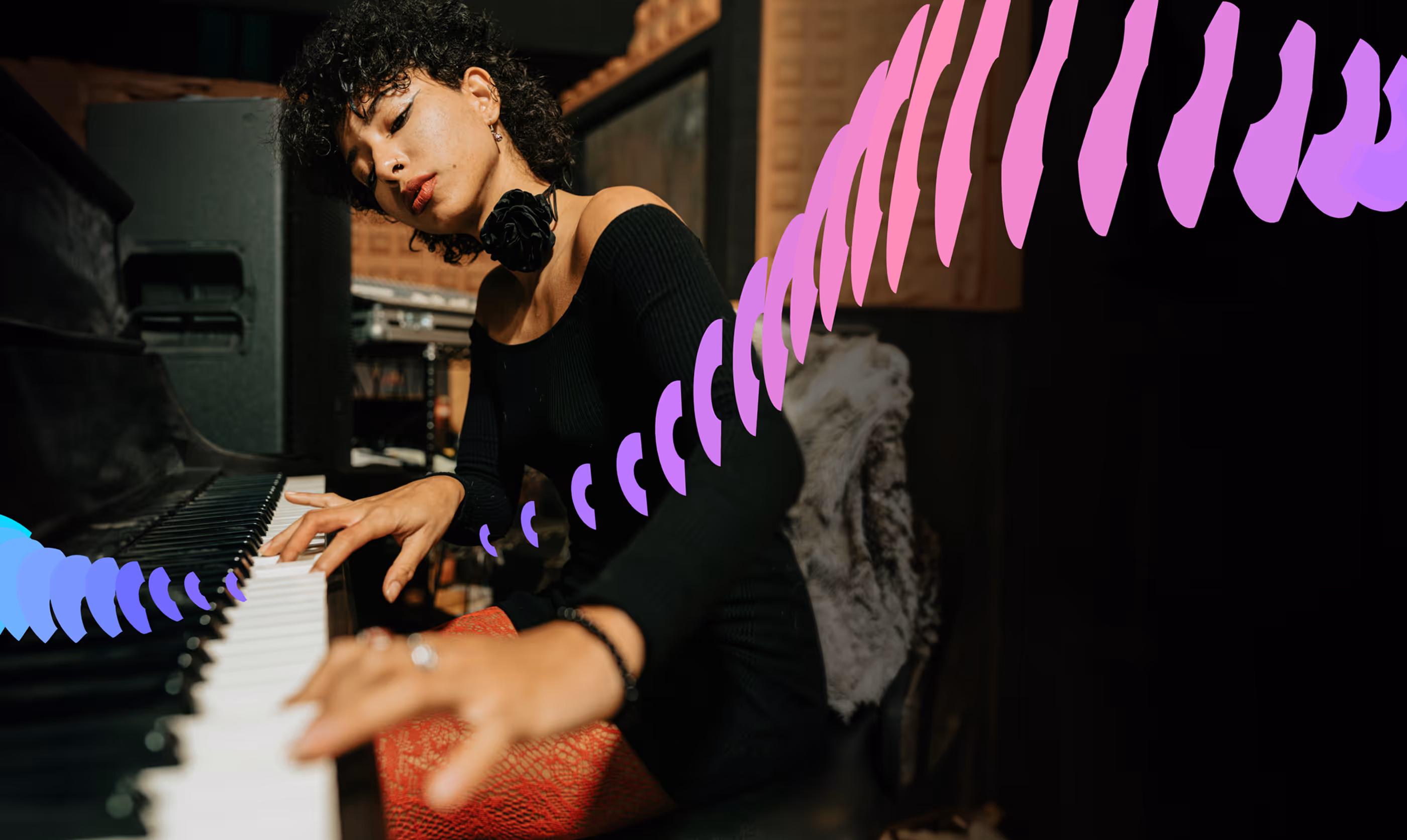 Curly-haired woman in black plays piano with colorful abstract sound wave overlay.