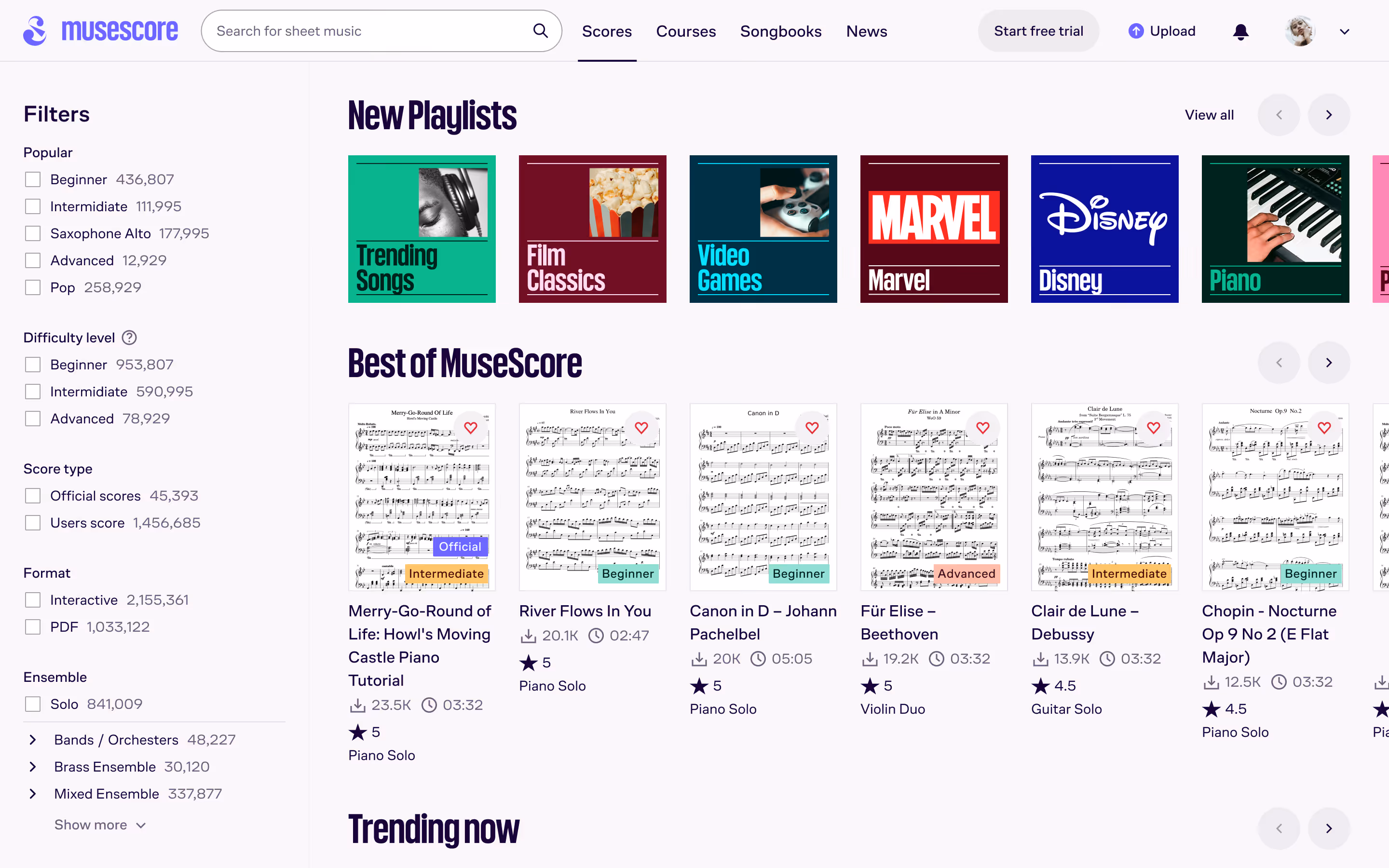 MuseScore website dashboard showing new playlists like Trending Songs, Film Classics, Video Games, Marvel, Disney, and Piano with best sheet music scores including Merry-Go-Round of Life, River Flows In You, Canon in D, Für Elise, Clair de Lune, and Chopin Nocturne.