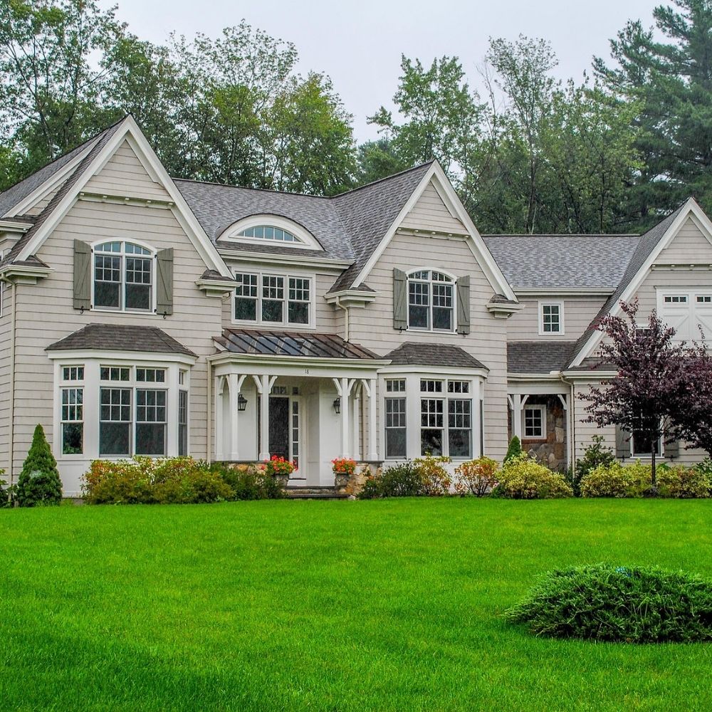 Light brown exterior of a house in Wellesley, MA