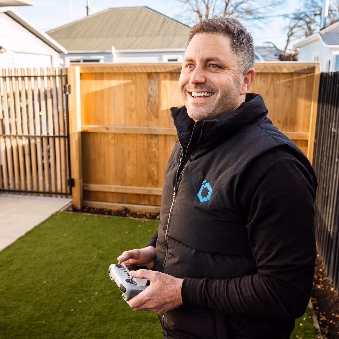 Insight Building Inspections owner and specialist Nick conducting a roof inspection with a drone