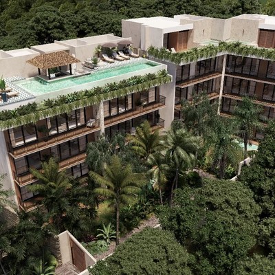 A middle-left view of a Building featuring vegetation and apartment.