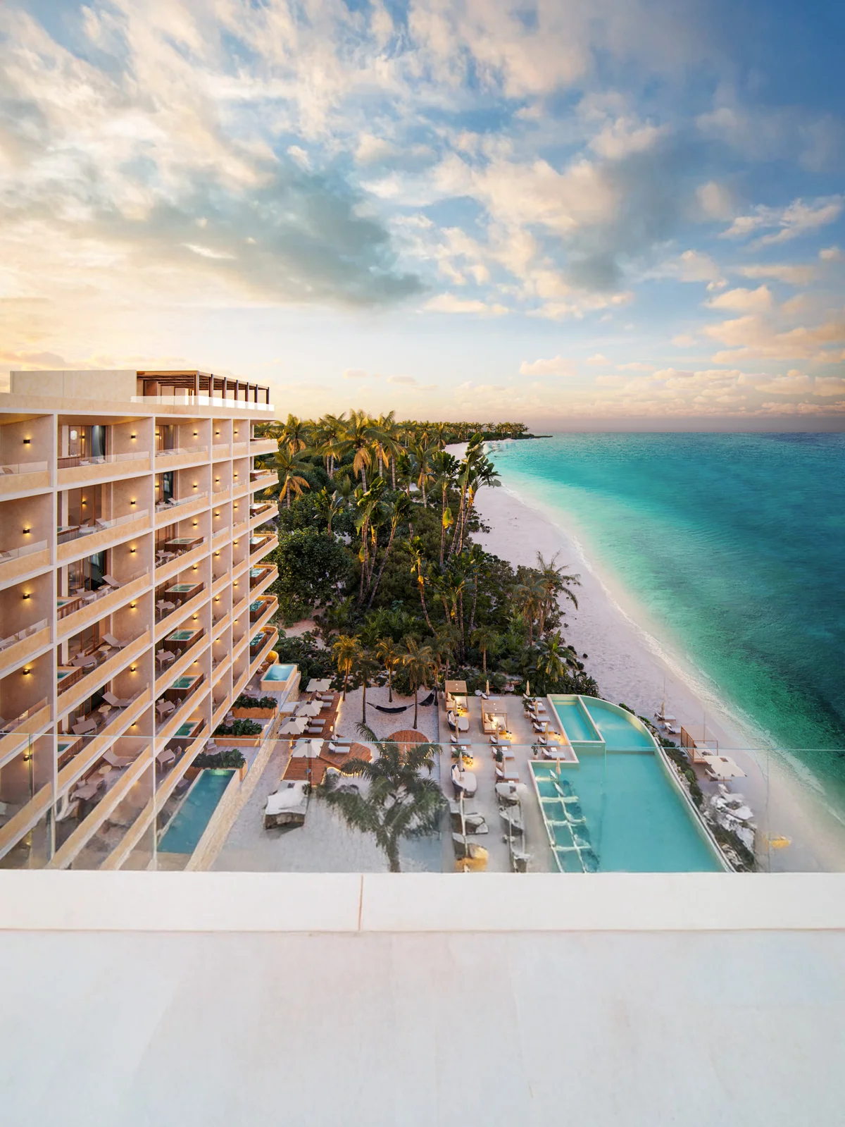 Image of a Beachfront Resort, featuring Ocean View Balconies and Private Plunge Pools.