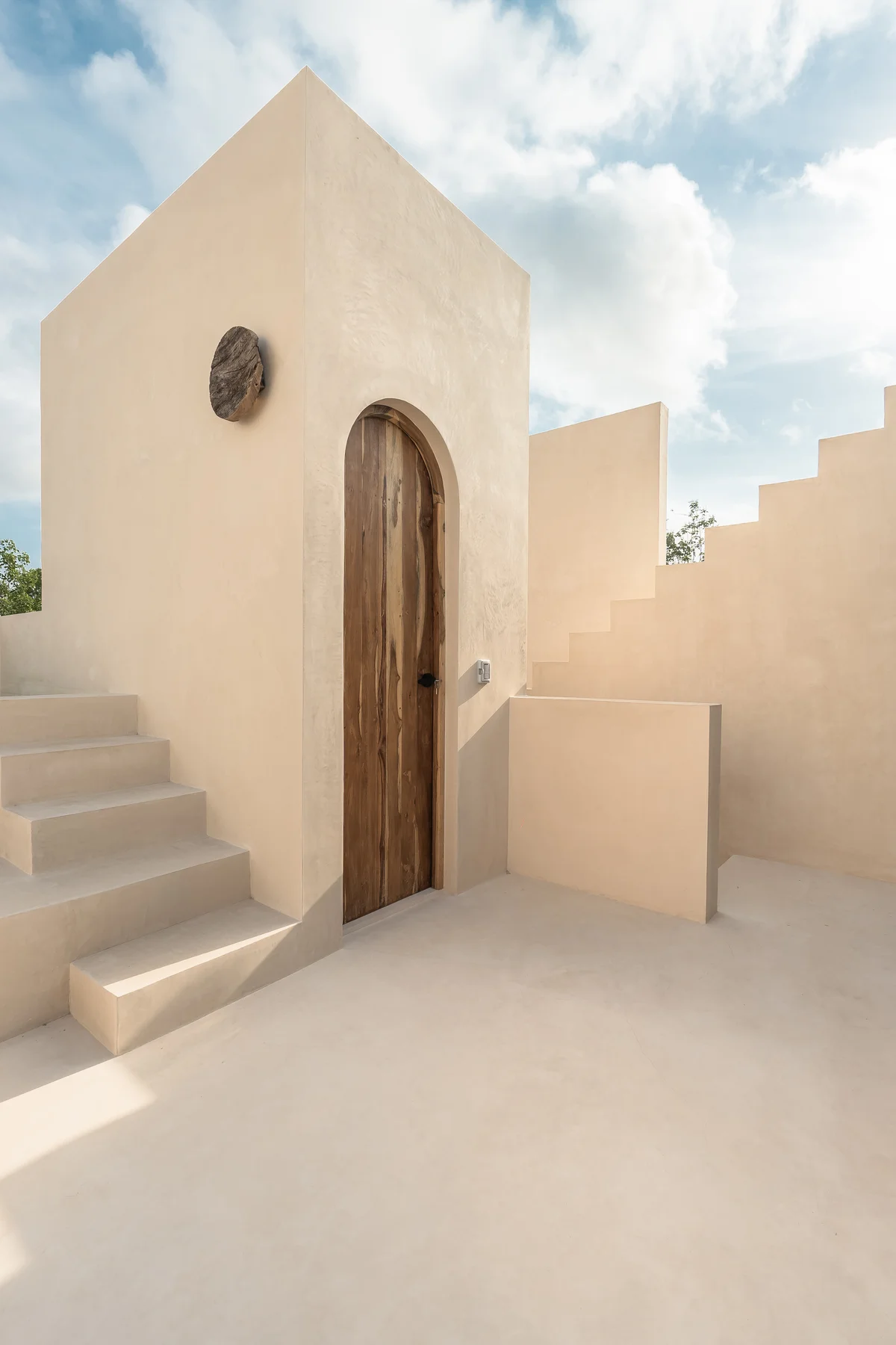 Image of a Rooftop Terrace, featuring Minimalist Architecture and Stucco Finish.