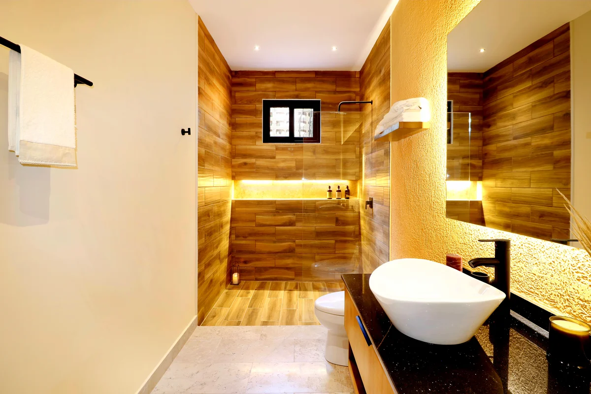 Image of a Modern Bathroom, featuring Walk-in Shower and Wood-Look Tile.