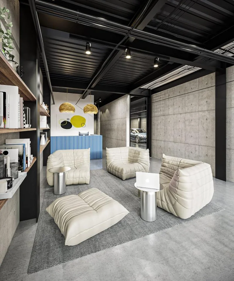 Image of a Modern Lobby, featuring Industrial-Chic Design and Exposed Concrete Walls.