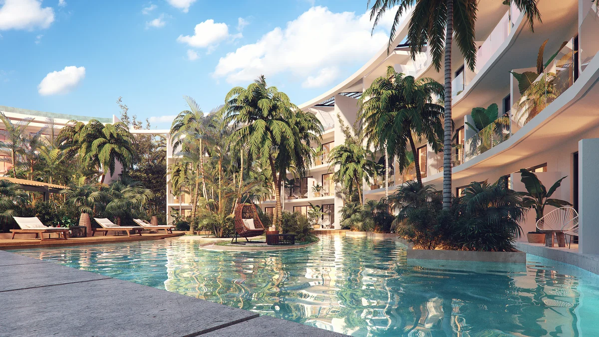 Image of a Lagoon-Style Pool, featuring Lush Tropical Gardens and Private Balconies.
