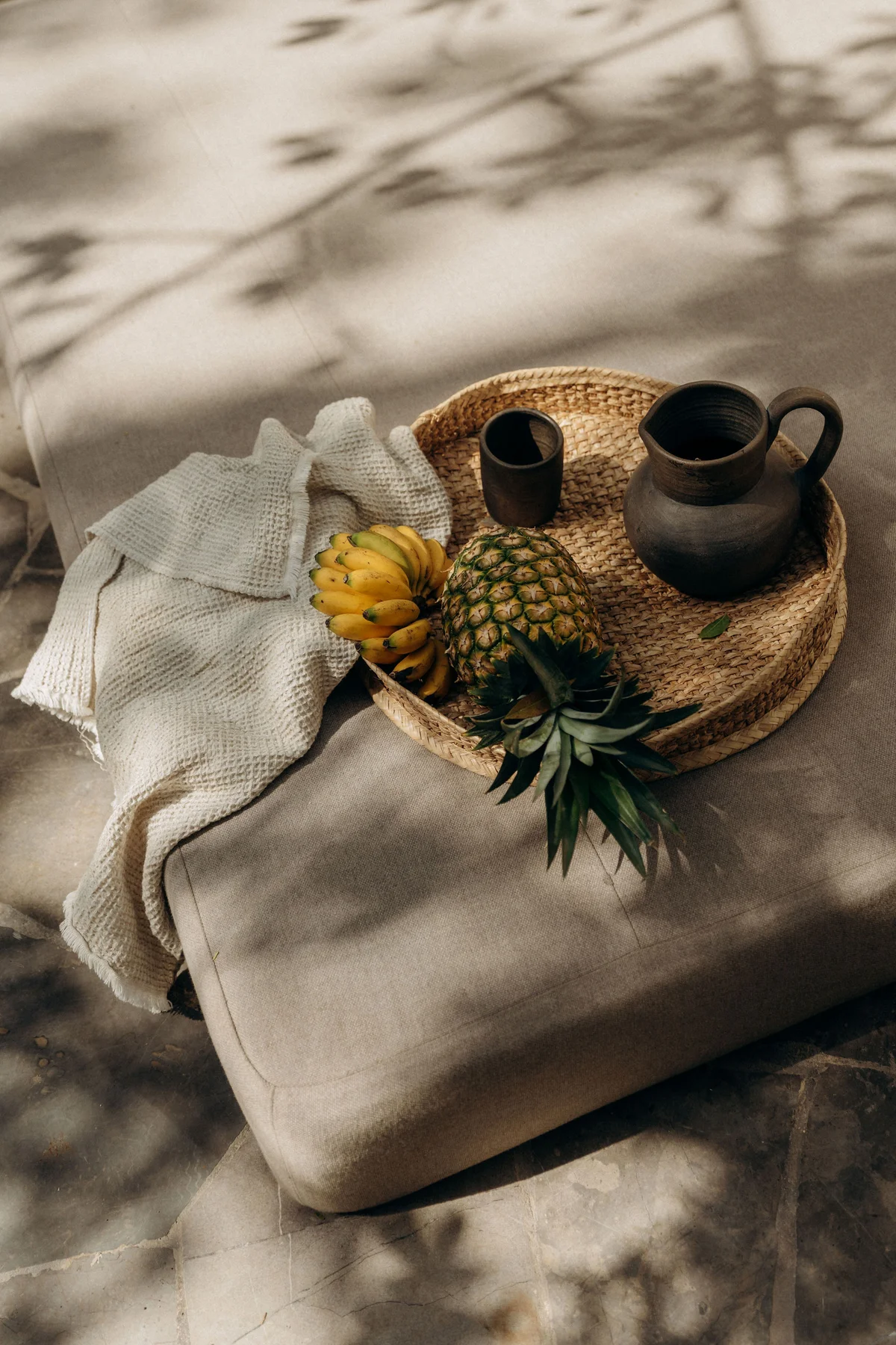 Image of a Outdoor Lounge Area, featuring Stone Patio and Tropical Ambiance.