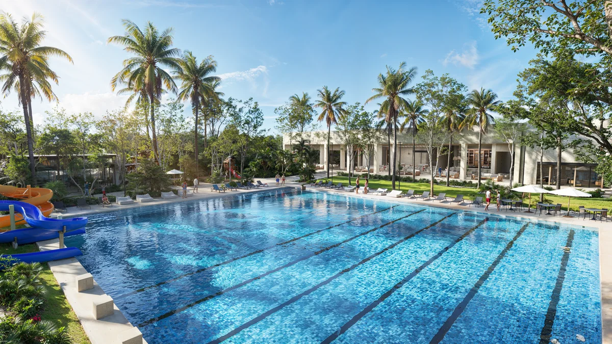 Image of a Resort-Style Pool, featuring Lap Pool and Lush Landscaping.